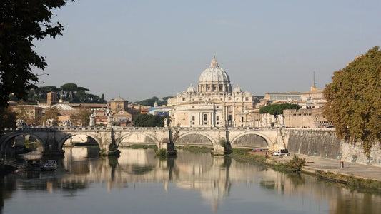 an old bridge with a church and other buildings in back as travel target for esim